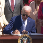 Biden signing the CHIPS and Science Act of 2022