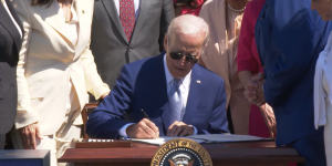 Biden signing the CHIPS and Science Act of 2022